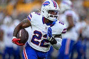 Buffalo Bills running back Ray Davis warms up before an NFL exhibition football game against the Pittsburgh Steelers, Saturday, Aug. 17, 2024, in Pittsburgh. (AP Photo/David Dermer)