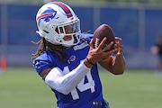 Buffalo Bills wide receiver Chase Claypool (14) makes a catch during NFL football practice in Orchard Park, N.Y., Tuesday, May 21, 2024. (AP Photo/Jeffrey T. Barnes)