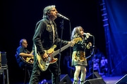 (L-R) John Doe and Exene Cervenka of the band X perform at Pacific Amphitheatre on July 30, 2023 in Costa Mesa, California. (Photo by Harmony Gerber/Getty Images)