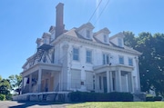 Syracuse University is seeking a demolition permit for the vacant mansion it owns at 727 Comstock Ave., but two city boards have recommended protecting the house because of its historical value. (Jeremy Boyer I JBoyer@syracuse.com)