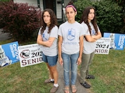 Melissa Menon, center, has hit a college aid roadblock for her daughters, Myra, left, and Caroline. The twins were top students at Corcoran High School. Friday, July 12, 2024, in Syracuse, New York. (Scott Schild | sschild@syracuse.com)


