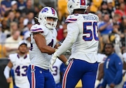 PITTSBURGH, PENNSYLVANIA - AUGUST 17: Greg Rousseau #50 of the Buffalo Bills celebrates with Joe Andreessen #44 after a defensive stop in the first quarter during the preseason game against the Pittsburgh Steelers at Acrisure Stadium on August 17, 2024 in Pittsburgh, Pennsylvania. (Photo by Justin Berl/Getty Images)