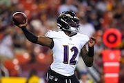 Baltimore Ravens quarterback Anthony Brown looks to throw a pass during the second half of an NFL preseason football game against the Washington Commanders, Monday, Aug. 21, 2023, in Landover, Md. (AP Photo/Julio Cortez)