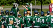 Hornet head coach Doug Madden talks to his players during half time of F-M's 17-12 win over the Red Rams at J-D Stadium on Saturday May 15, 2021. Roger Hagan Photography