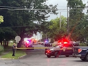 Multiple law enforcement agencies respond to a shooting involving Auburn police officers at Melone Village housing complex on Thursday, Aug. 8, 2024.