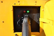 An electric school bus, leased by Beverly Public Schools in Beverly, Mass., receives a charge at a charging station in a bus yard, Thursday, Oct. 21, 2021, in Beverly, Mass. The district is planning to convert half its 44-bus fleet to electric by 2025 and the rest by 2030. Their transition is part of a trend in districts across the country to shift from diesel to electric school buses to improve air quality and combat climate change. (AP Photo/Michael Casey)