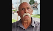 Paul Newman, 75, was shot and killed early Saturday morning while sitting on the front porch of his home in Utica, police said.