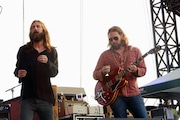 Chris Robinson and Rich Robinson of The Black Crowes perform at the Lockn' Festival at Oak Ridge Farm on Sunday September 8, 2013 in Arrington Virginia.(Photo by John Davisson/Invision/AP)