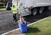 Syracuse DPW workers pickup trash on Sedgwick Road April 12, 2022. Syracuse officials are making changes to its trash collection routes that will mean a different pickup day for about a quarter of city households. (Dennis Nett | dnett@syracuse.com)