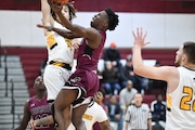 #3 Jaiden Holloman of Corcoran drives to basket. Henninger VS Corcoran Boys basketball at Corcoran High School, Syracuse Invitational Showcase Tournament.  Syracuse, NY Saturday December 10, 2022. Mark Murphy | Contributing Photographer.