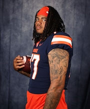 New Orange offensive lineman Savion Washington poses during Syracuse media day July 16 at the Ensley Athletic Center. Washington transferred from Colorado, where the O-line endured intense criticism in 2023. 