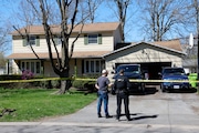 Police go through 4945 Darien Drive and the neighboring yards where Syracuse Police officer Michael E. Jensen and sheriff’s Lt. Michael Hoosock were killed Sunday in shootout, Salina, NY, Tuesday April 16, 2024.
(Scott Schild | sschild@syracuse.com) 