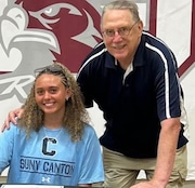 Central Square girls basketball player Natalie Bush and head coach Kevin Brazell